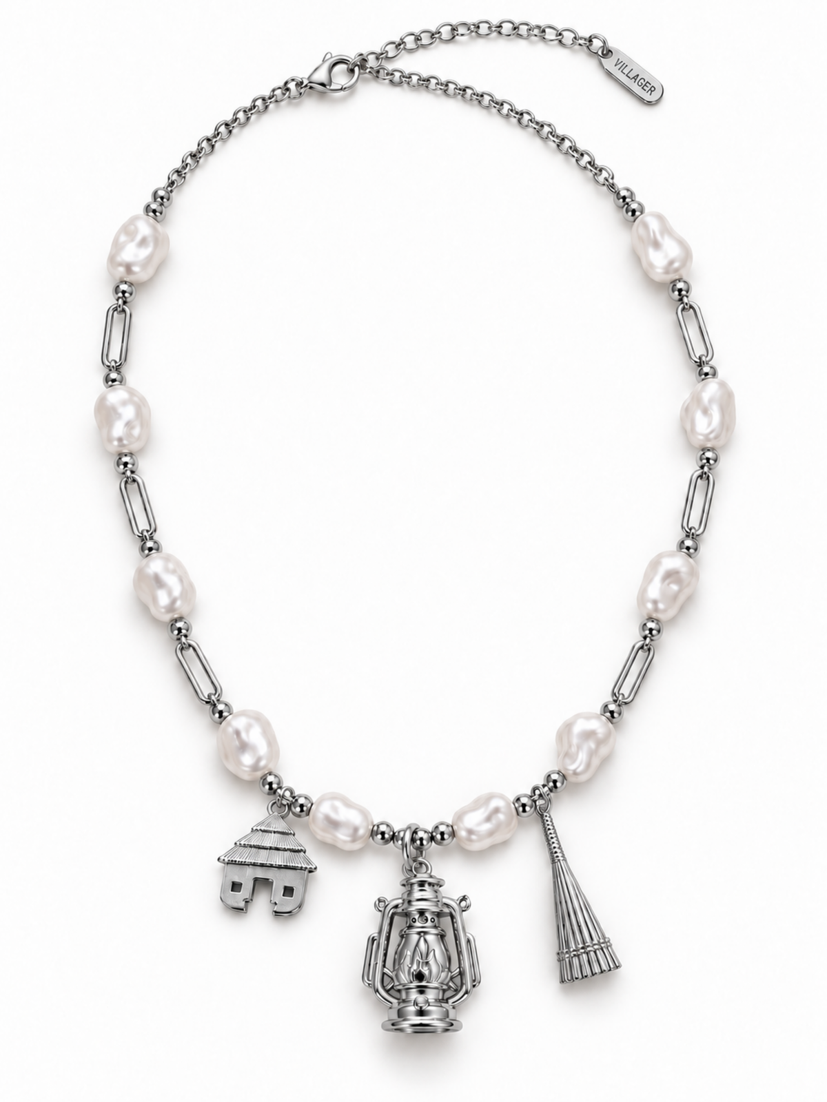 Villager Roots silver-colour necklace with ten pearl-effect acrylic beads and hut, lantern and broom pendants, on a white background